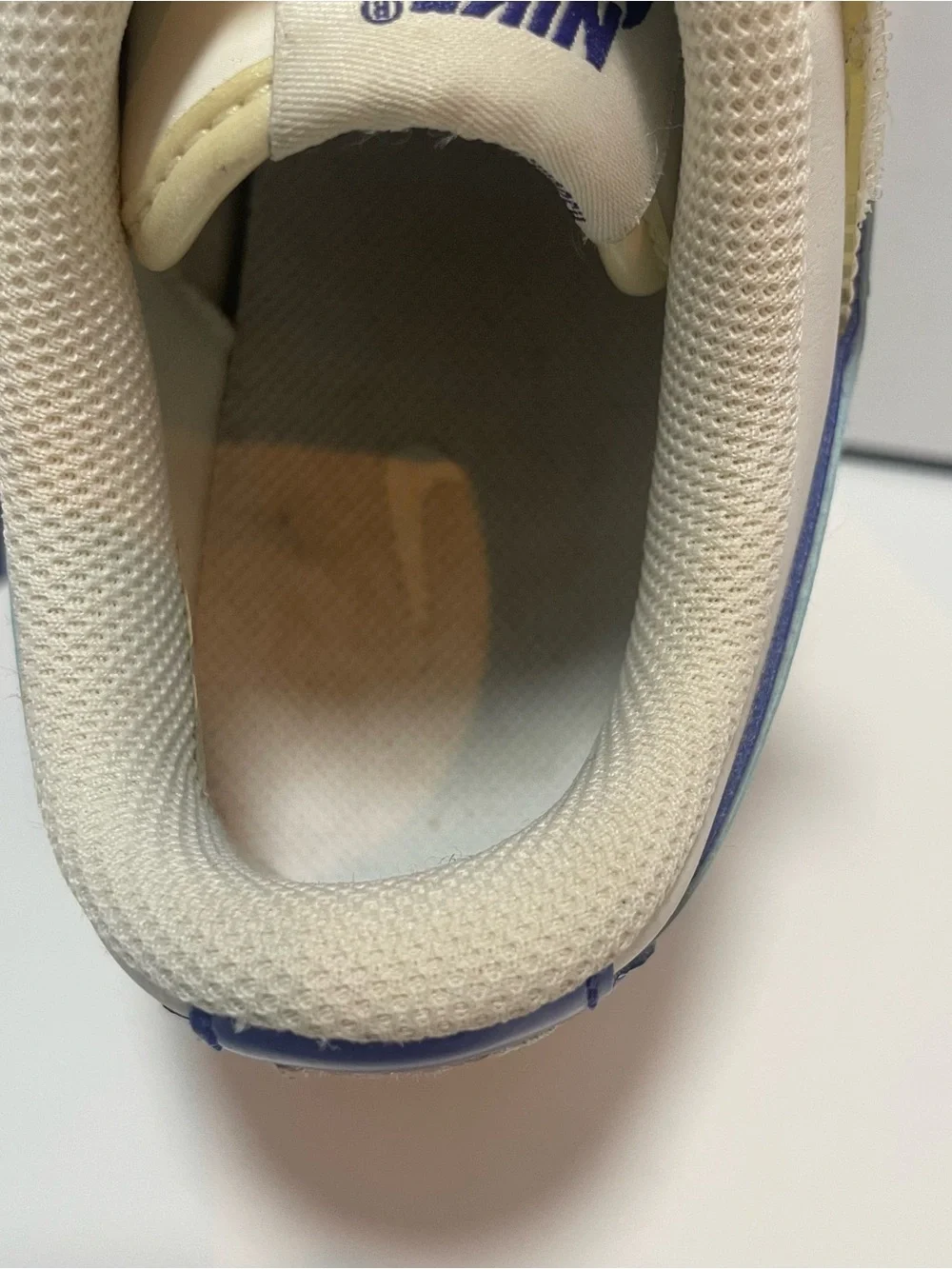 Nike Kids White and Blue Low-Top Sneakers with Light Yellow Accents